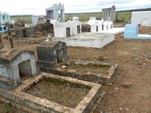 Local cemetery during Dia de Lost Muertos (Day of the Dead) where families honor and celebrate their deceased.