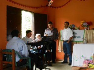 Men's impromptu "church choir" singing during Fiesta Patronal 2013